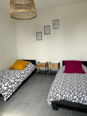 T2 maison entre calme & ville